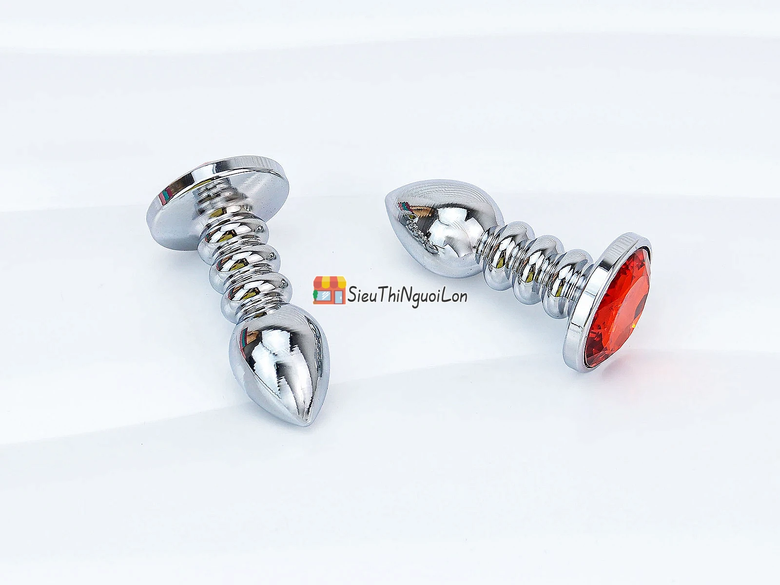 Kích hậu inox xoắn ốc đuôi pha lê cam – mát lạnh, kích thích