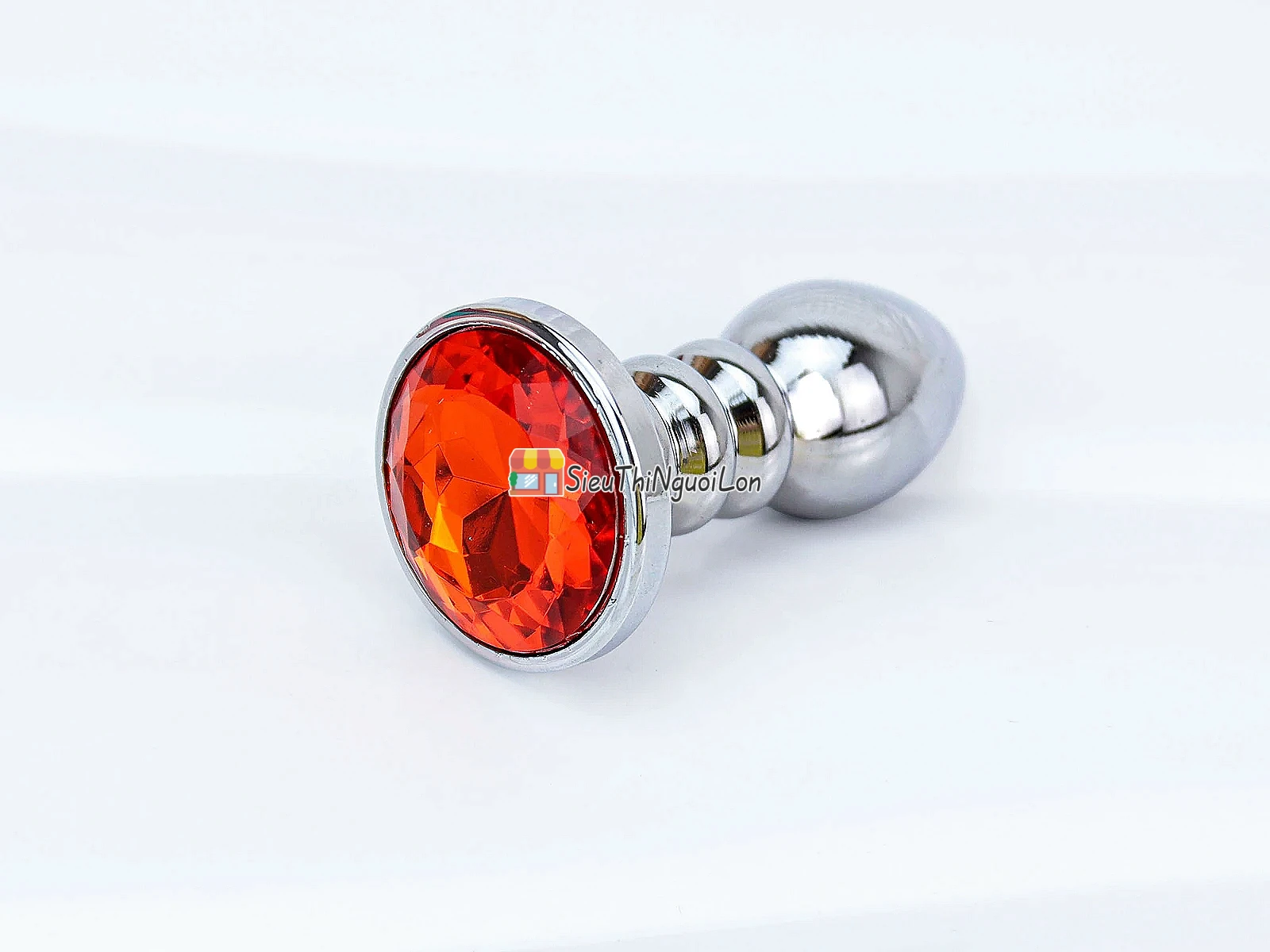 Kích hậu inox xoắn ốc đuôi pha lê cam – mát lạnh, kích thích
