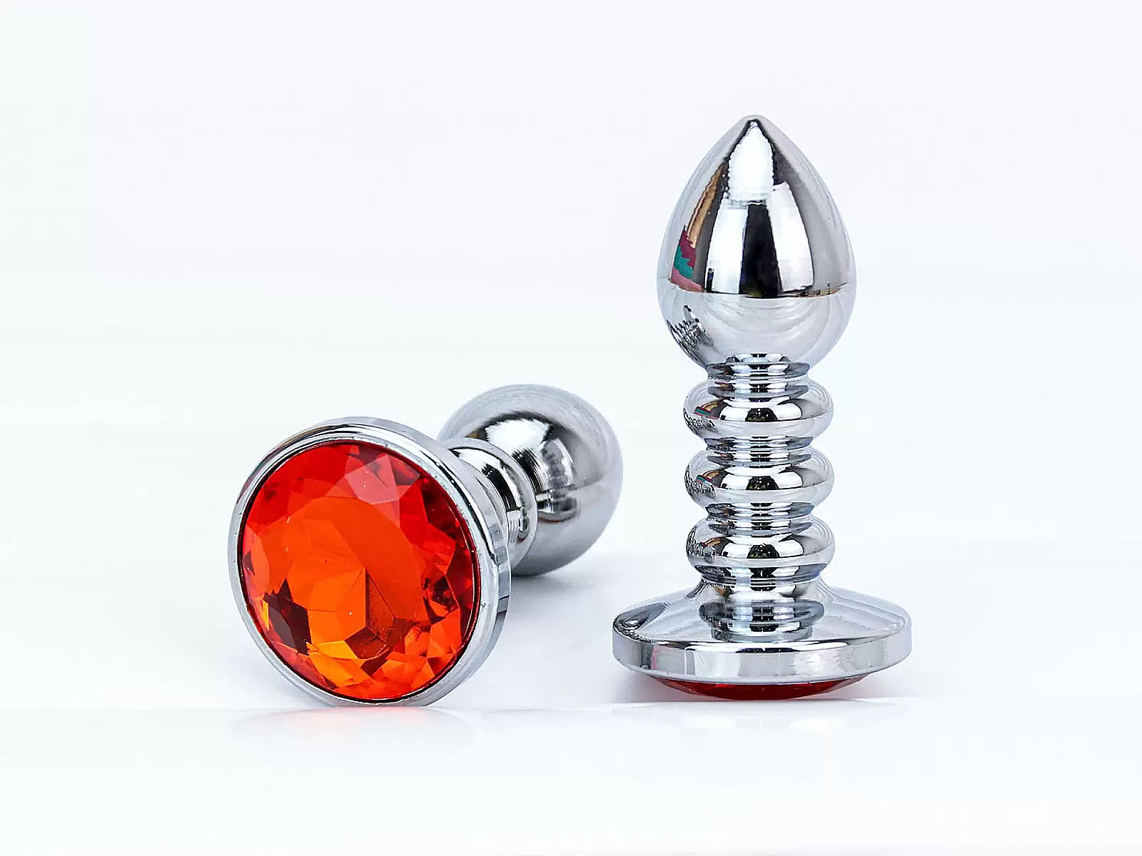 Plug inox xoắn ốc đuôi pha lê cam – quyến rũ sáng