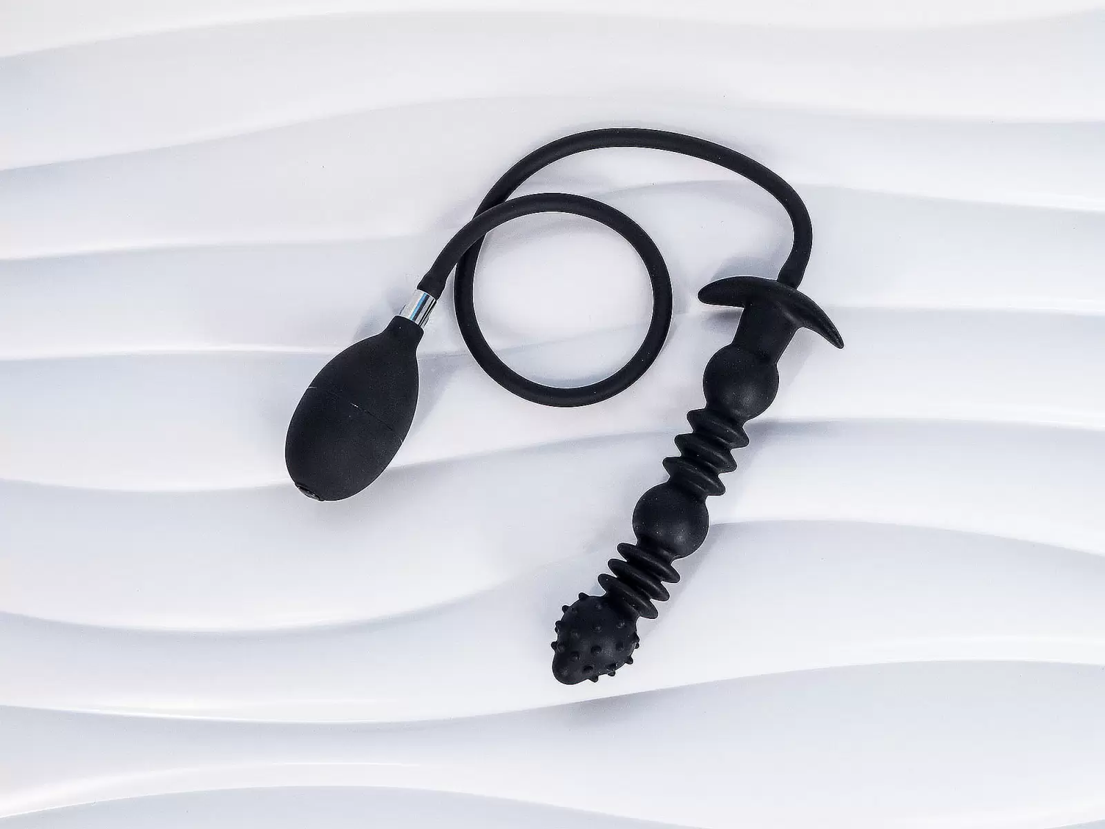 Plug hậu môn bơm hơi – silicon phồng to rung
